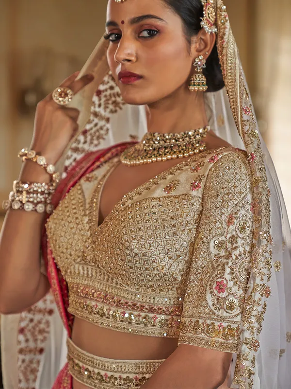 Cream bridal lehenga choli with two dupatta