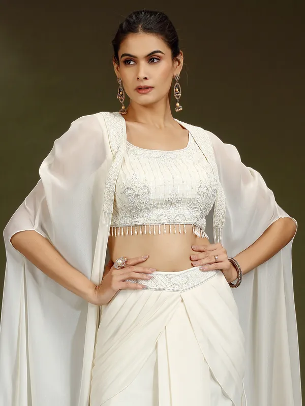 Cream chiffon designer lehenga choli with shrug