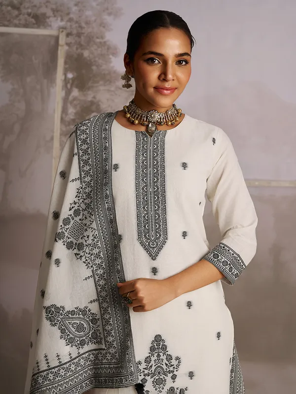 Cream color printed silk kurti set
