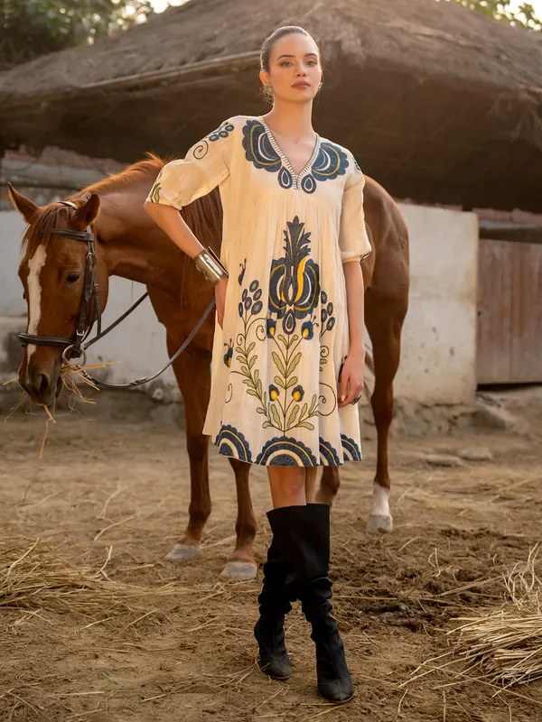 Cream cotton kurti with resham and embroidery