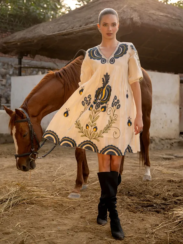 Cream cotton kurti with resham and embroidery