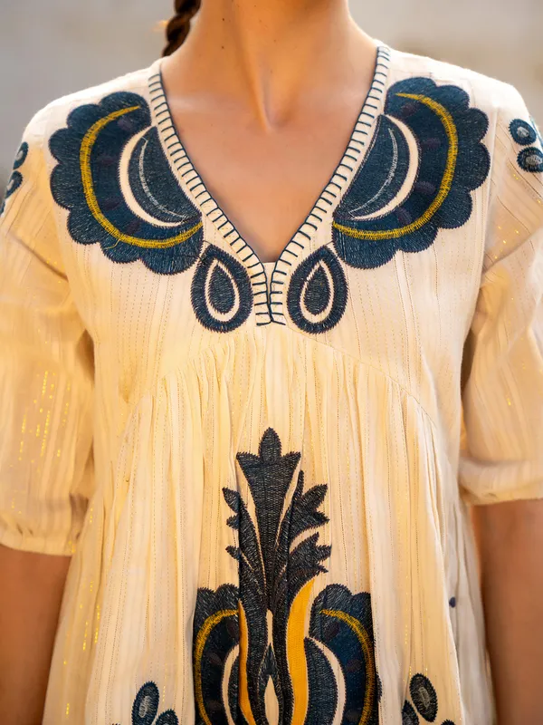 Cream cotton kurti with resham and embroidery