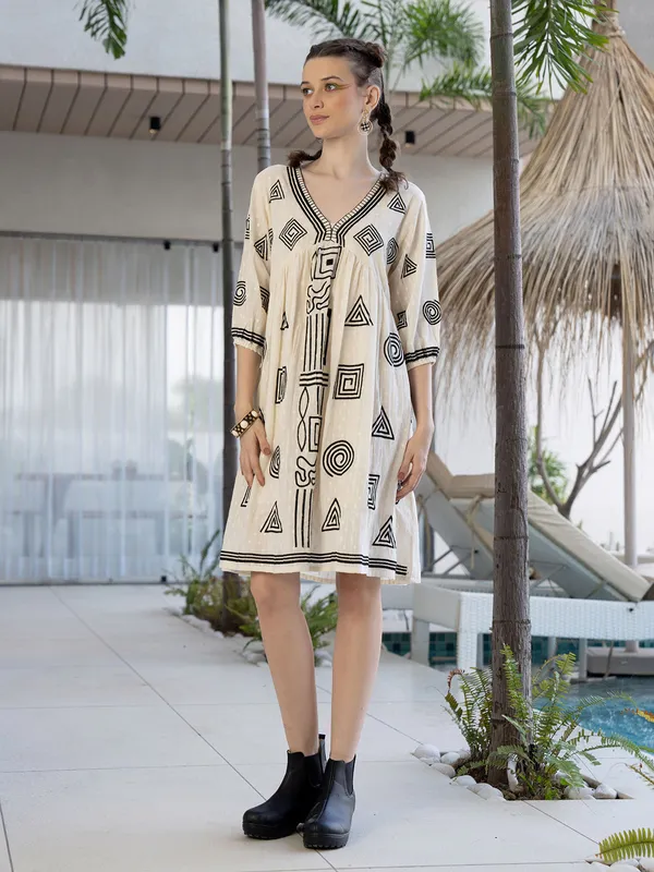 Cream cotton printed kurti with V neck