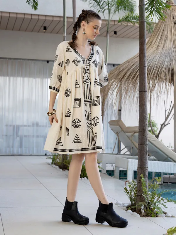 Cream cotton printed kurti with V neck