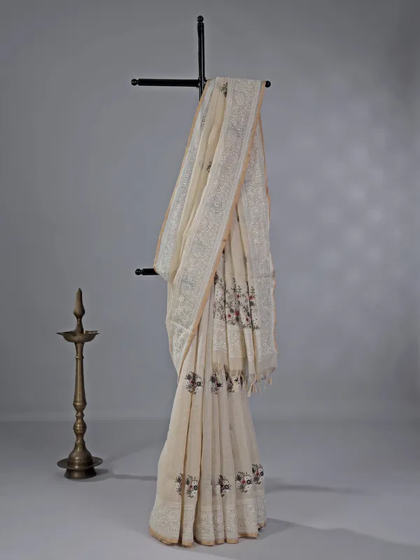 Cream cotton silk saree with embroidered elegance