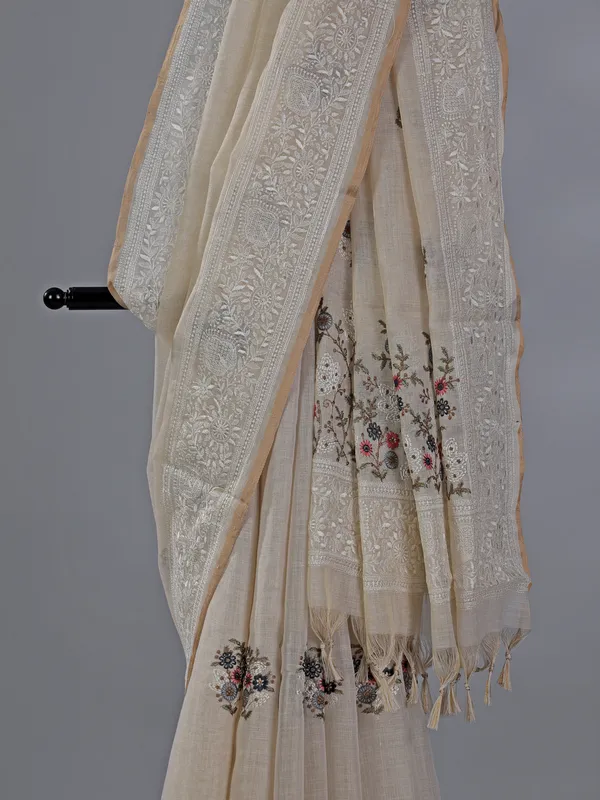 Cream cotton silk saree with embroidered elegance