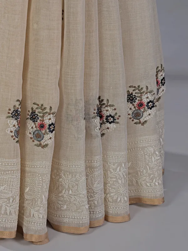 Cream cotton silk saree with embroidered elegance