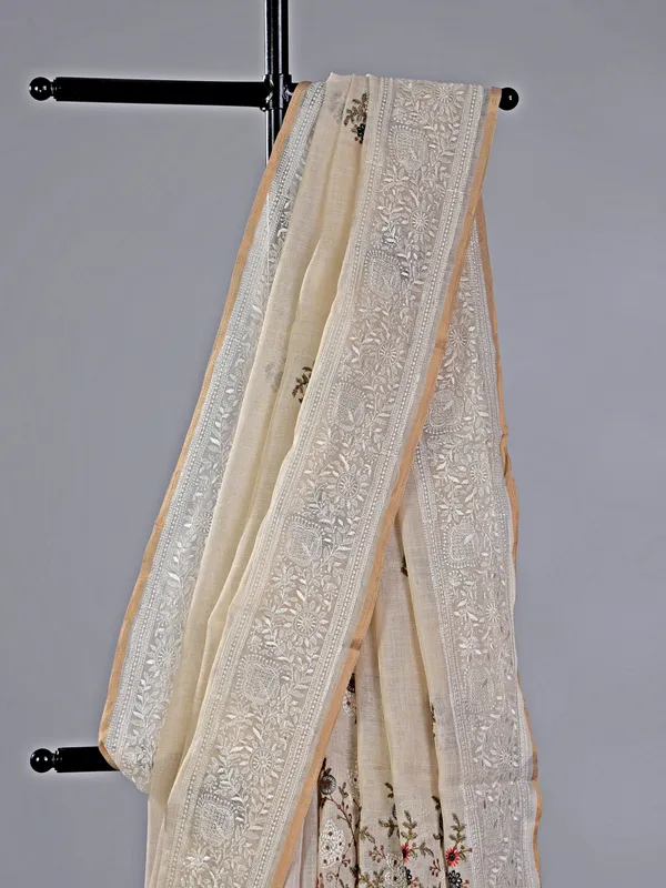 Cream cotton silk saree with embroidered elegance