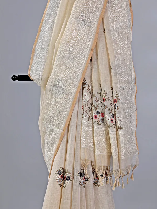 Cream cotton silk saree with embroidered elegance