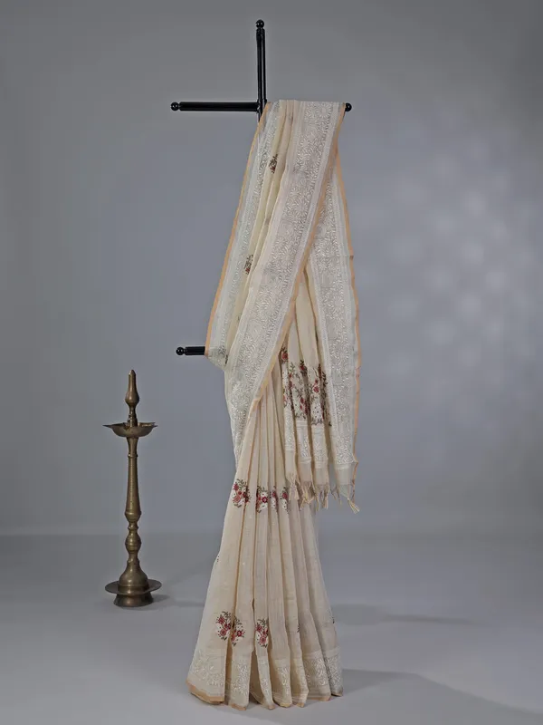 Cream cotton silk saree with embroidery and sequins