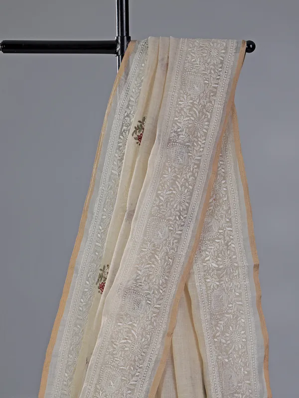 Cream cotton silk saree with embroidery and sequins