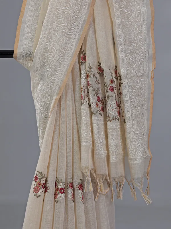 Cream cotton silk saree with embroidery and sequins