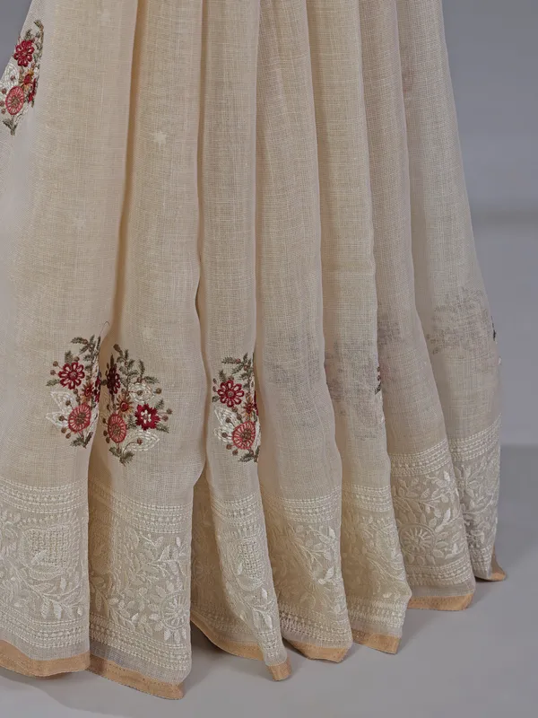 Cream cotton silk saree with embroidery and sequins