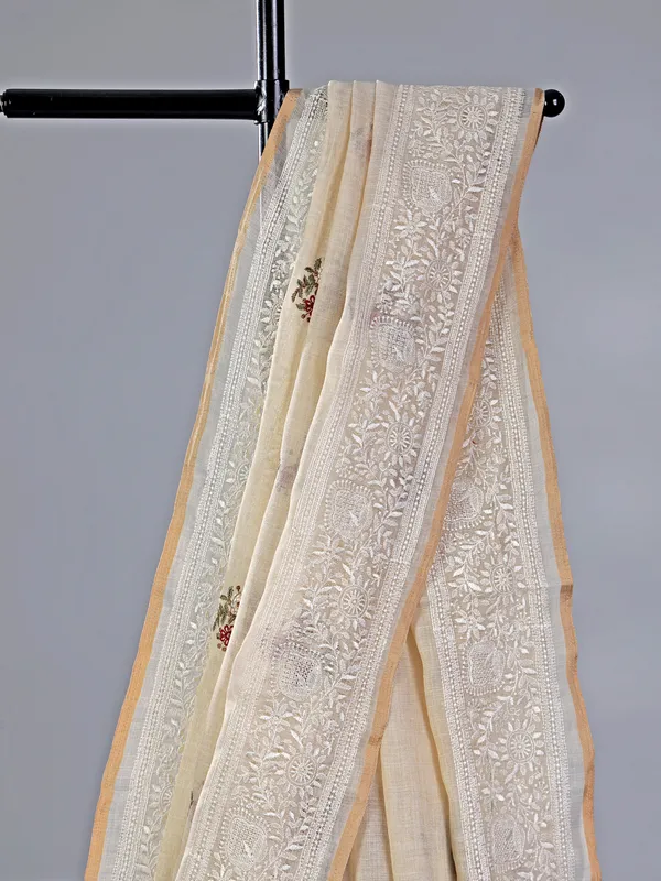 Cream cotton silk saree with embroidery and sequins