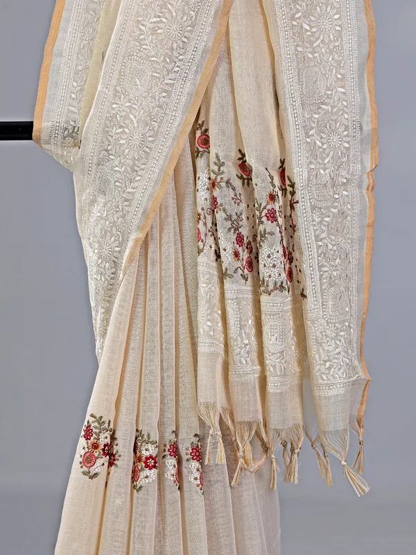 Cream cotton silk saree with embroidery and sequins
