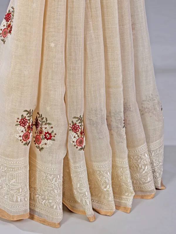 Cream cotton silk saree with embroidery and sequins
