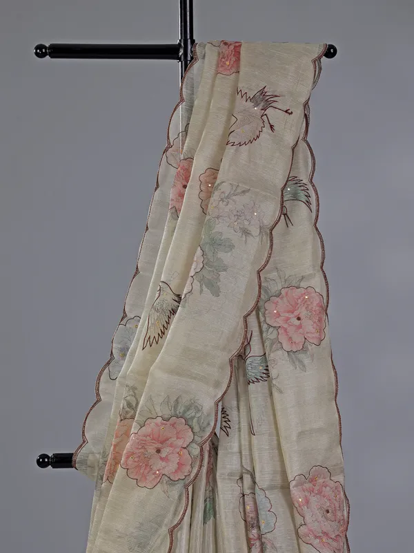 Cream cotton silk saree with printed details
