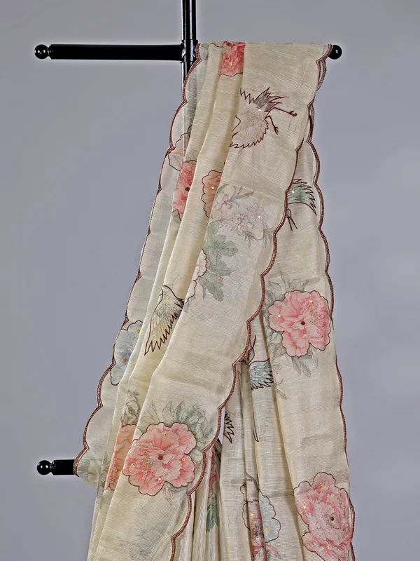 Cream cotton silk saree with printed details