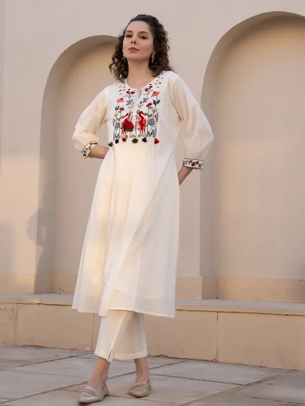 Cream cotton silk yoke style kurti with keyhole neck