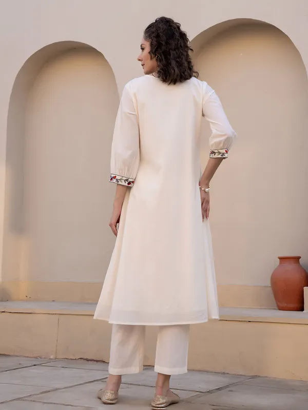Cream cotton silk yoke style kurti with keyhole neck