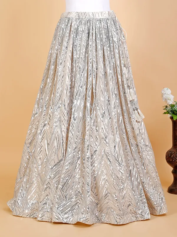 Cream designer lehenga choli in net