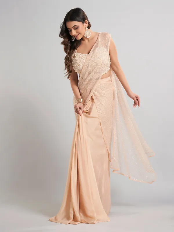 Cream designer ready to wear saree for elegant celebrations
