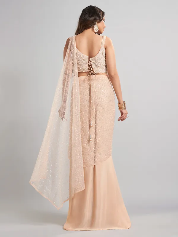 Cream designer ready to wear saree for elegant celebrations