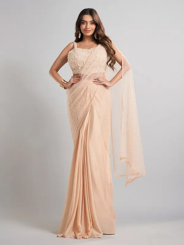 Cream designer ready to wear saree for elegant celebrations