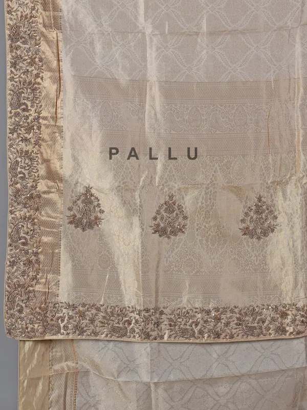 Cream designer tissue silk saree