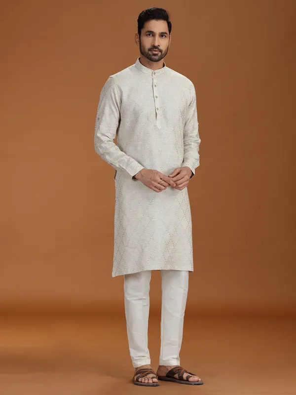Cream embroidered kurta set with linen fabric