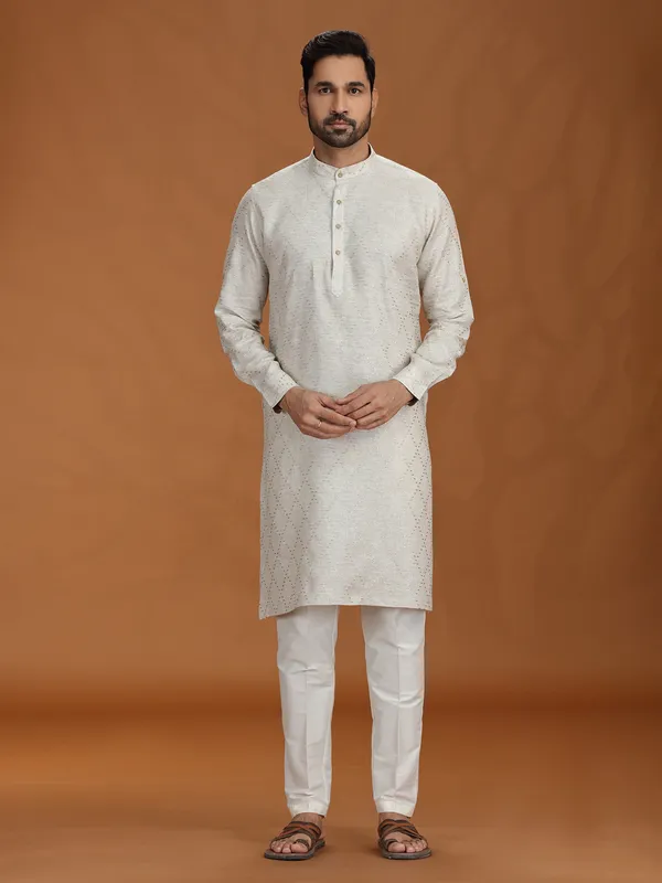 Cream embroidered kurta set with linen fabric
