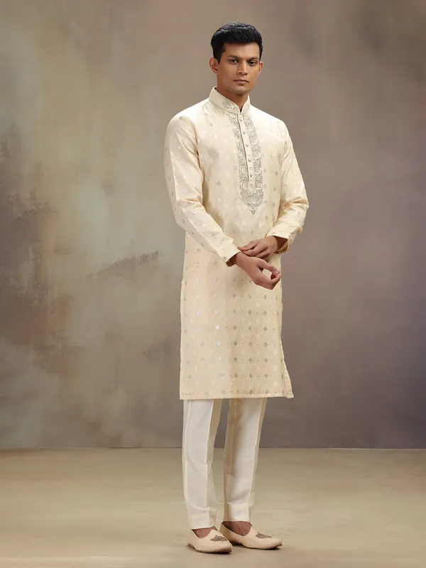 Cream festive wear kurta suit with rich embellishment