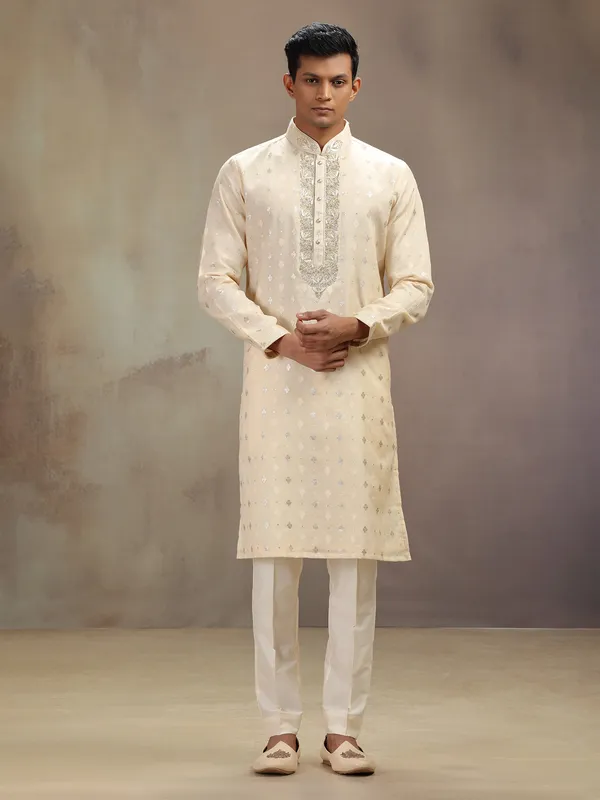 Cream festive wear kurta suit with rich embellishment
