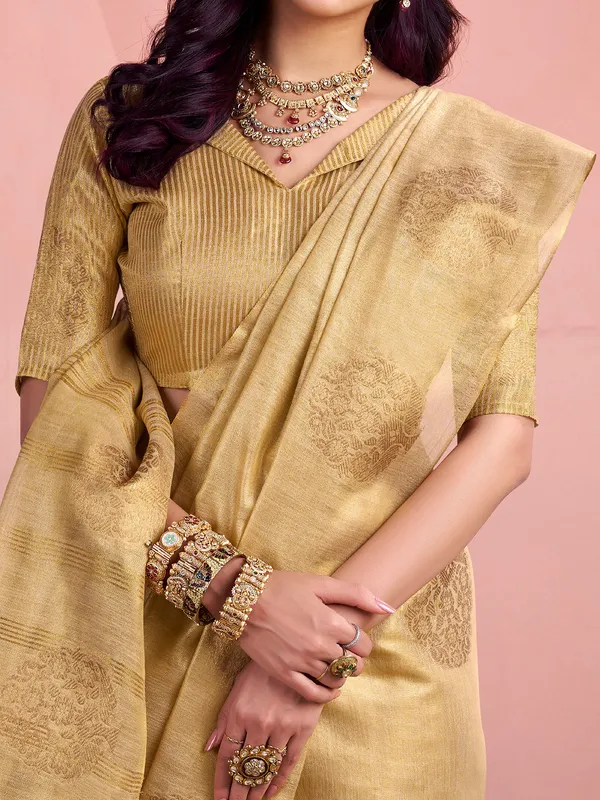 Cream festive wear saree in tissue silk