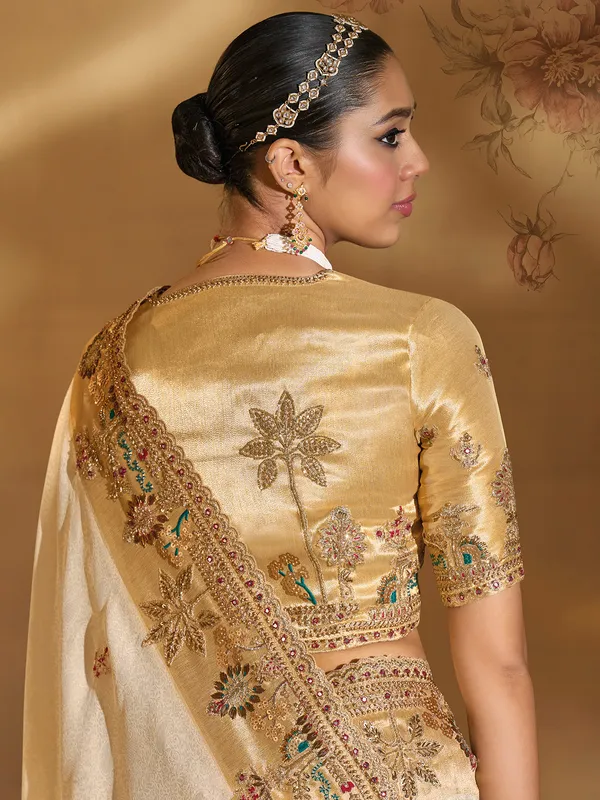 Cream festive wear silk saree with resham work