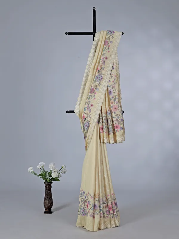 Cream floral art silk saree with embroidery and resham work