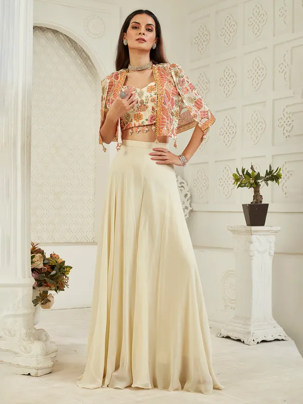 Cream georgette jacket palazzo suit with cowrie shells