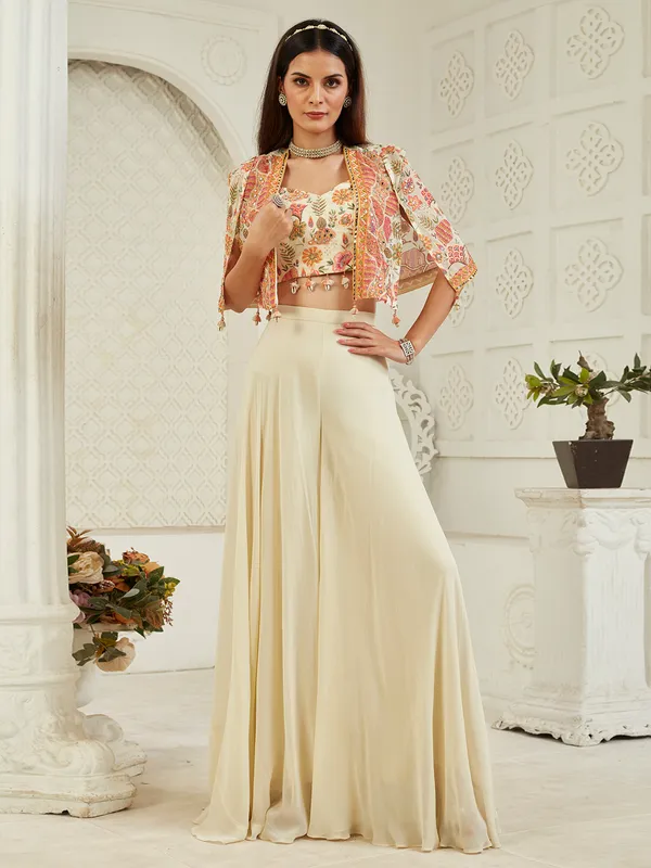 Cream georgette jacket palazzo suit with cowrie shells