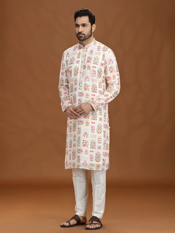 Cream georgette kurta suit with colorful motifs