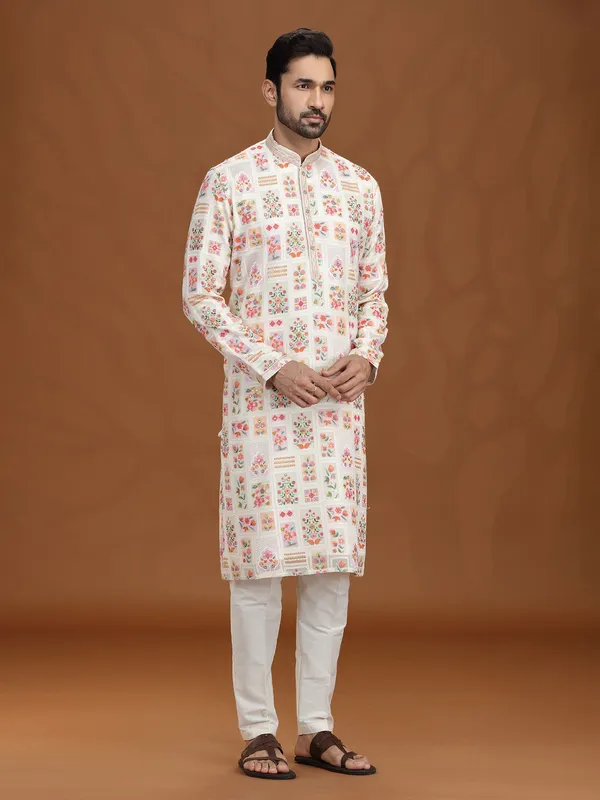 Cream georgette kurta suit with colorful motifs
