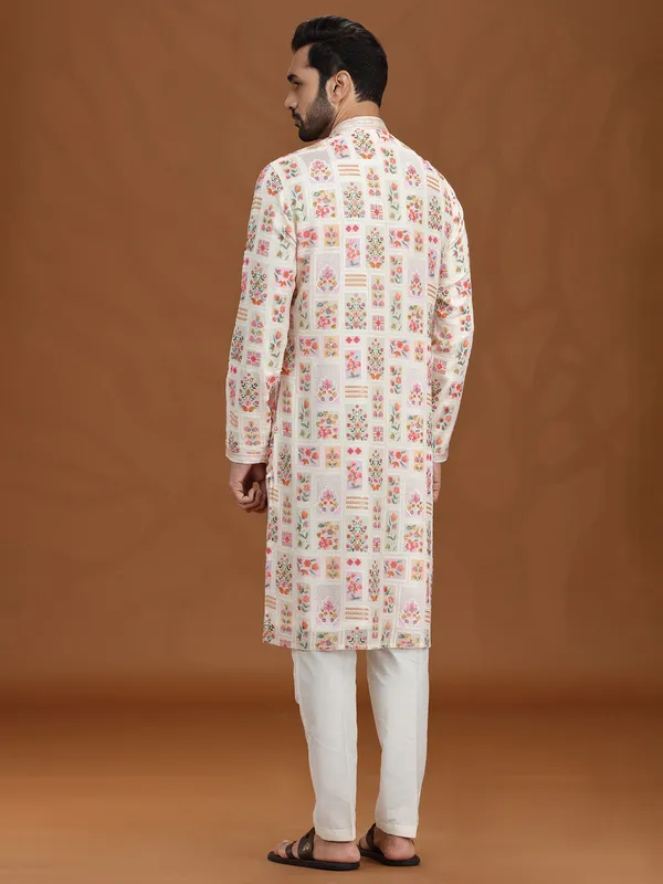 Cream georgette kurta suit with colorful motifs