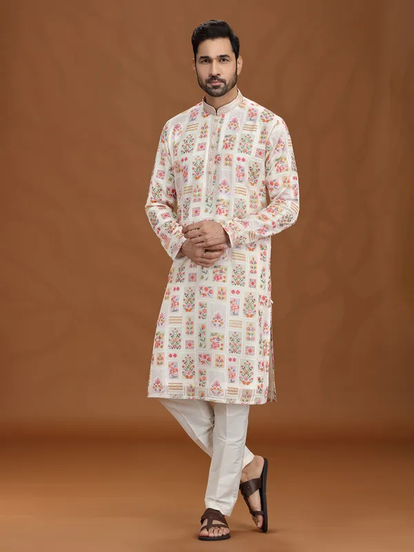 Cream georgette kurta suit with colorful motifs