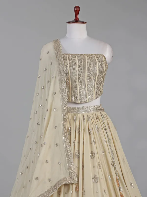 Cream georgette lehenga choli with resham detailing