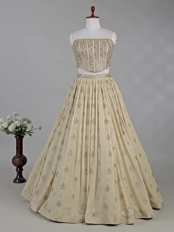 Cream georgette lehenga choli with resham detailing