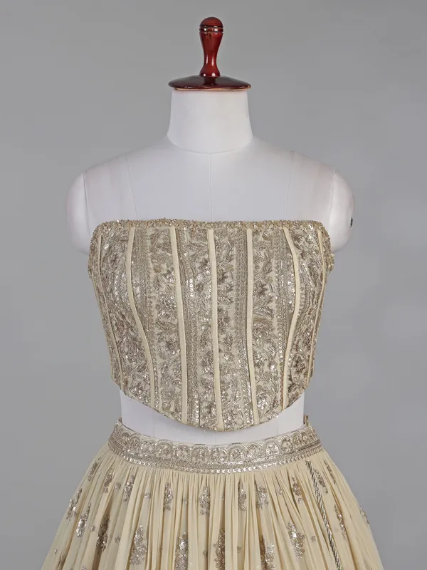 Cream georgette lehenga choli with resham detailing