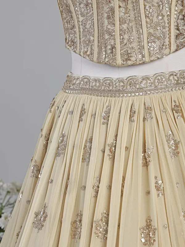 Cream georgette lehenga choli with resham detailing