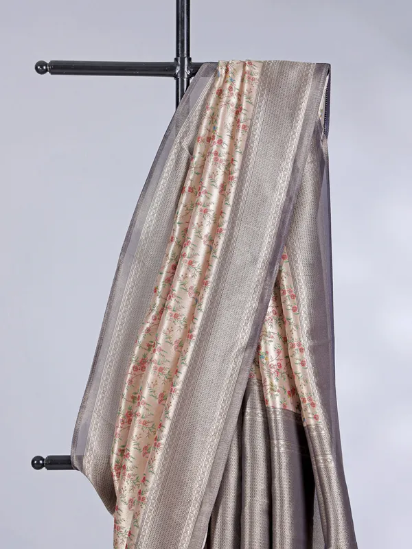 Cream georgette silk saree with contrast floral design