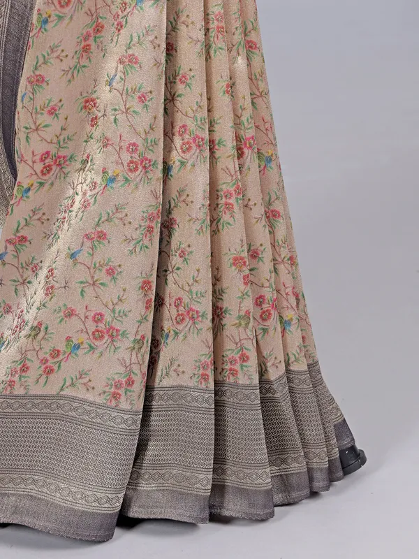 Cream georgette silk saree with contrast floral design