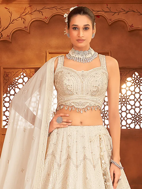 Cream georgette sweetheart neck lehenga choli