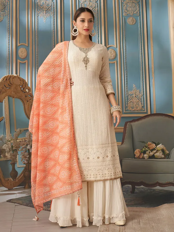 Cream georgette zardosi work palazzo suit